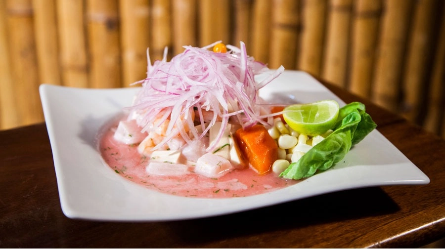 Ceviche a peruvian dish from the coastal area, involving fresh fish, lemon, pepper and lemon